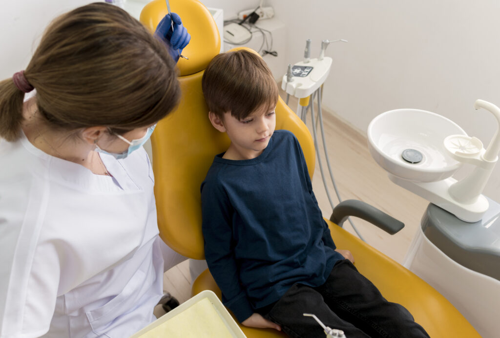 dentist-cleaning-child-s-teeth